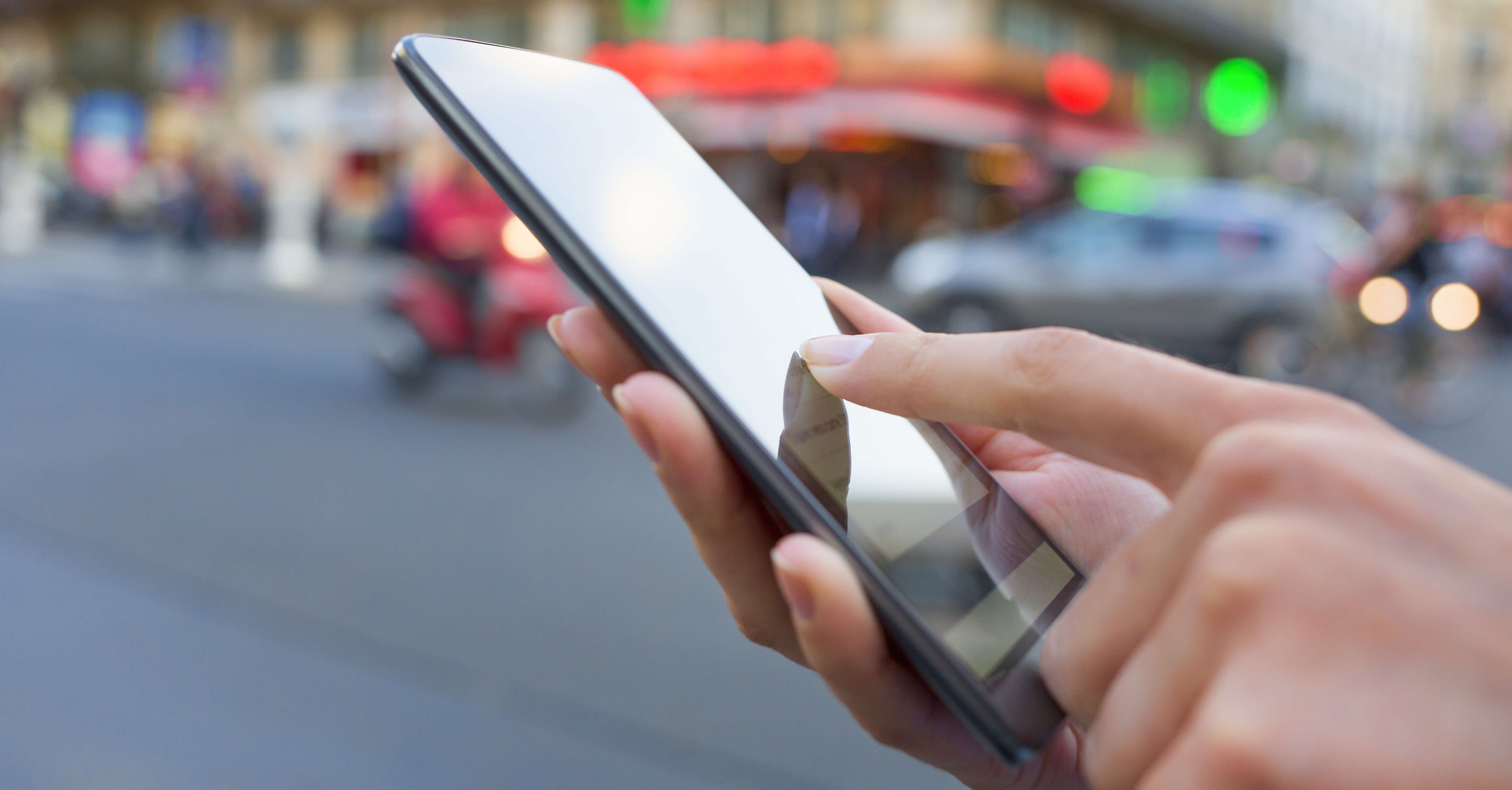 Phone in hadns FB squashed