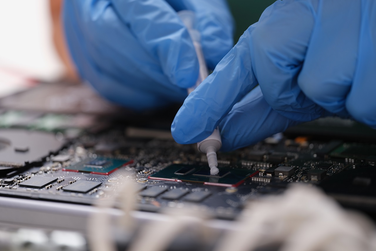 Cpu microchip processor with thermal paste closeup Cpu microchip processor with thermal paste closeup